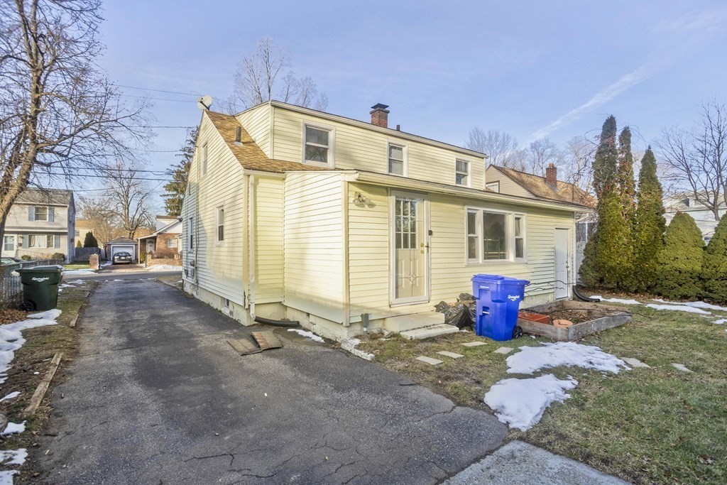 33 Campechi Street Springfield, MA 01104 - Photo 33 of 37 a view of a house with backyard and sitting area