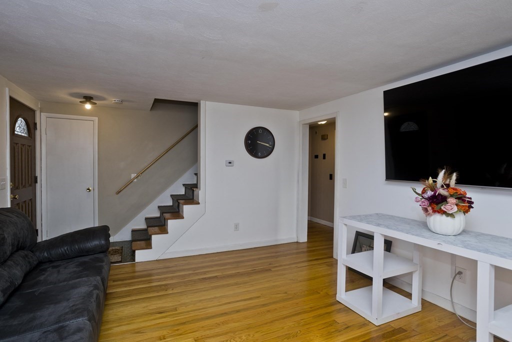 33 Campechi Street Springfield, MA 01104 - Photo 4 of 37 a view of dining room with furniture and wooden floor