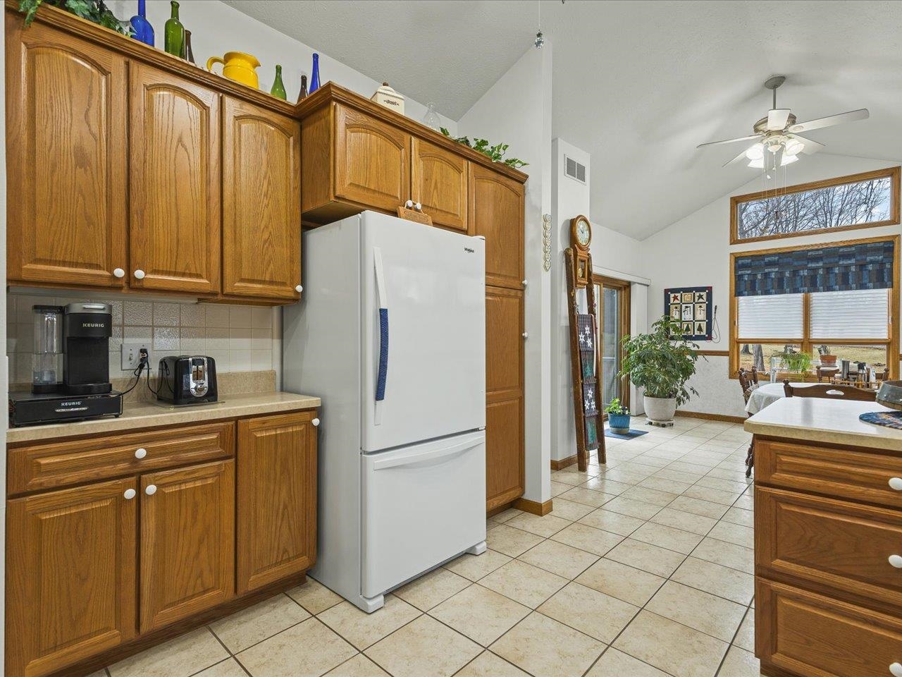 625 Lake Summerset Road Lake Summerset, IL 61019 - Photo 12 of 51 a kitchen with a refrigerator and a sink
