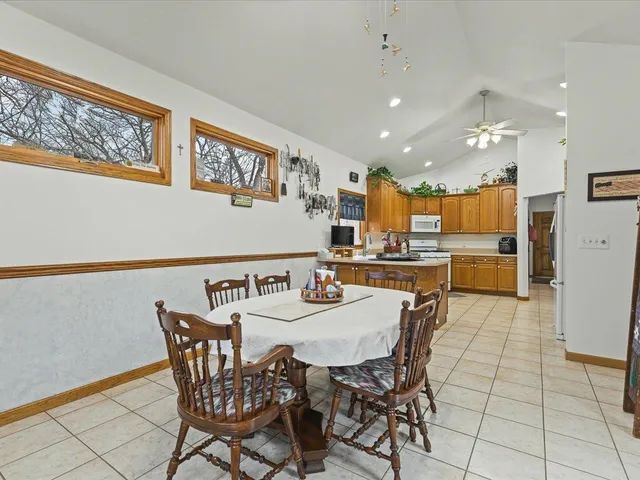 a view of a dining room with furniture