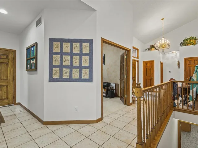 a view of a livingroom with furniture and windows