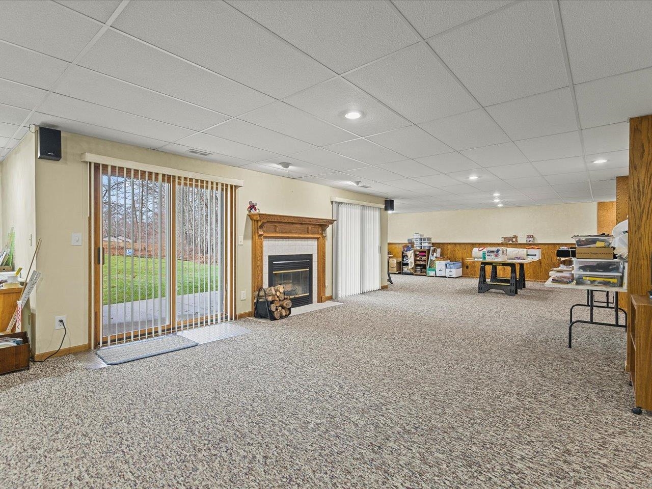 625 Lake Summerset Road Lake Summerset, IL 61019 - Photo 23 of 51 a view of a livingroom with furniture and a garage
