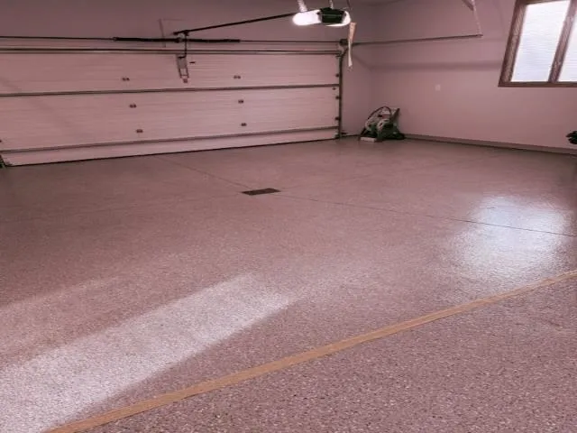 a view of a room with wooden floor and fence