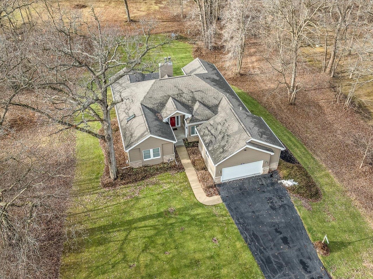 625 Lake Summerset Road Lake Summerset, IL 61019 - Photo 49 of 51 a view of a house with a yard