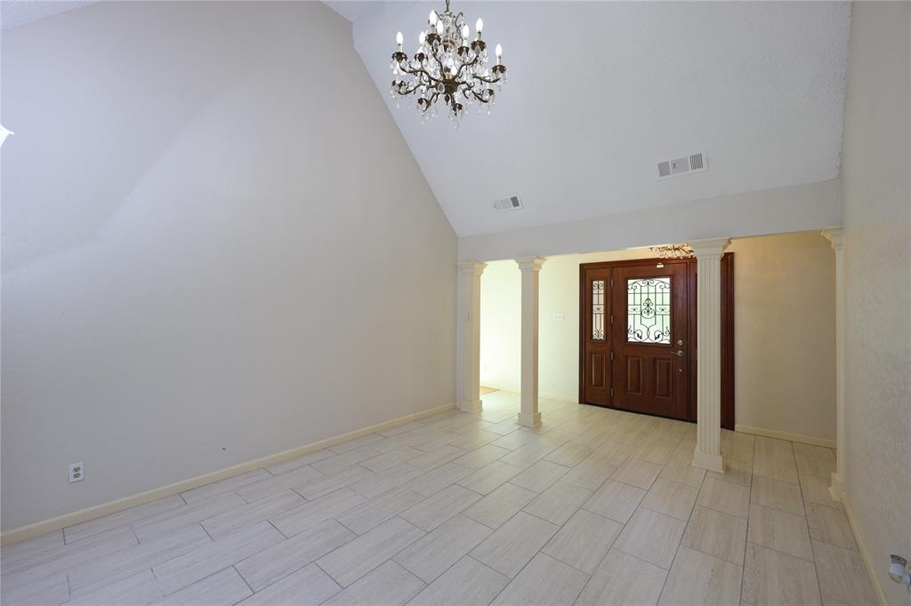 907 Red Oak Creek Road Ovilla, TX 75154 - Photo 5 of 20 a view of an empty room with a window