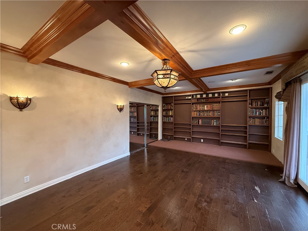 2119 Ridgeview Terrace Drive Signal Hill, CA 90755 - Photo 13 of 22 a view of an empty room with wooden floor and windows