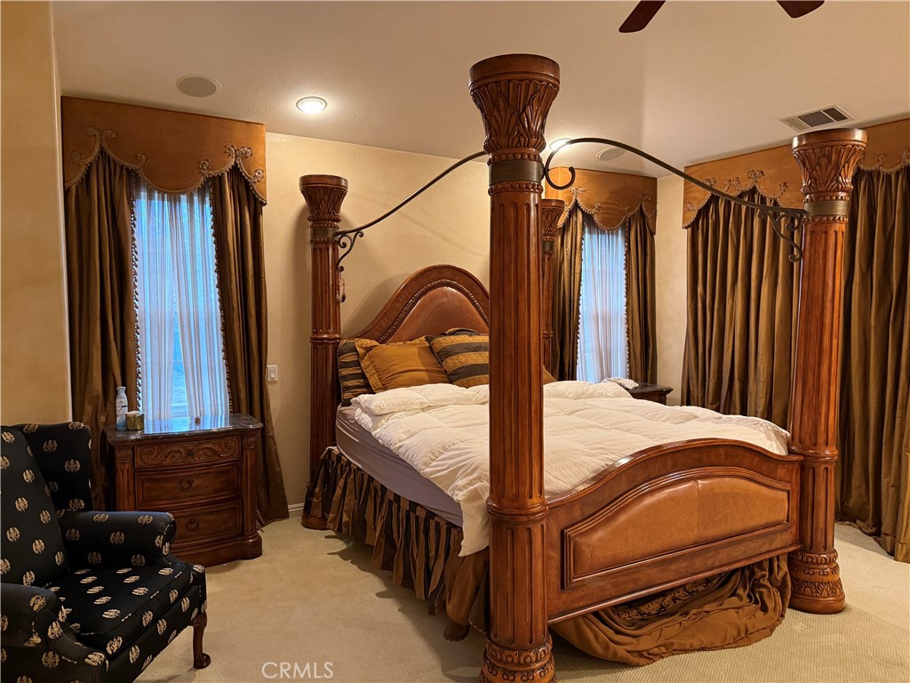 2119 Ridgeview Terrace Drive Signal Hill, CA 90755 - Photo 17 of 22 a bedroom with a bed window and dresser