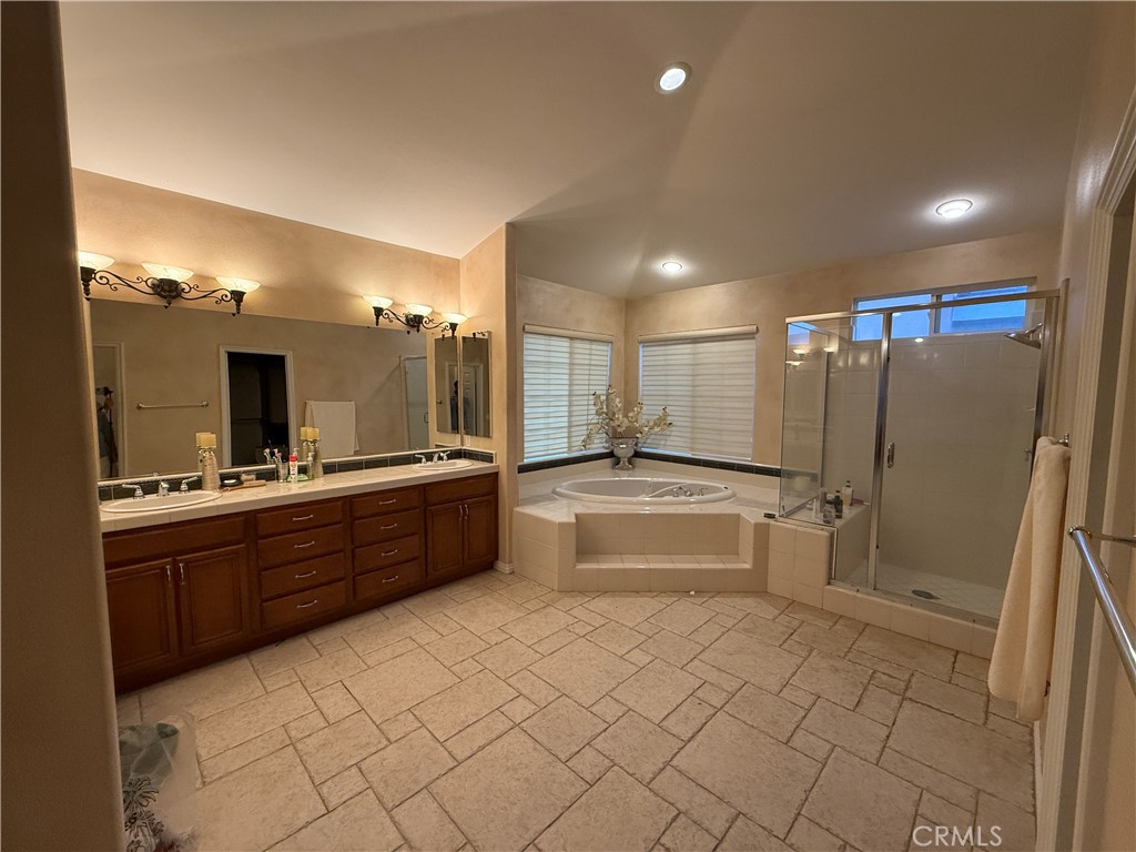 2119 Ridgeview Terrace Drive Signal Hill, CA 90755 - Photo 19 of 22 a large bathroom with a large tub and double vanity