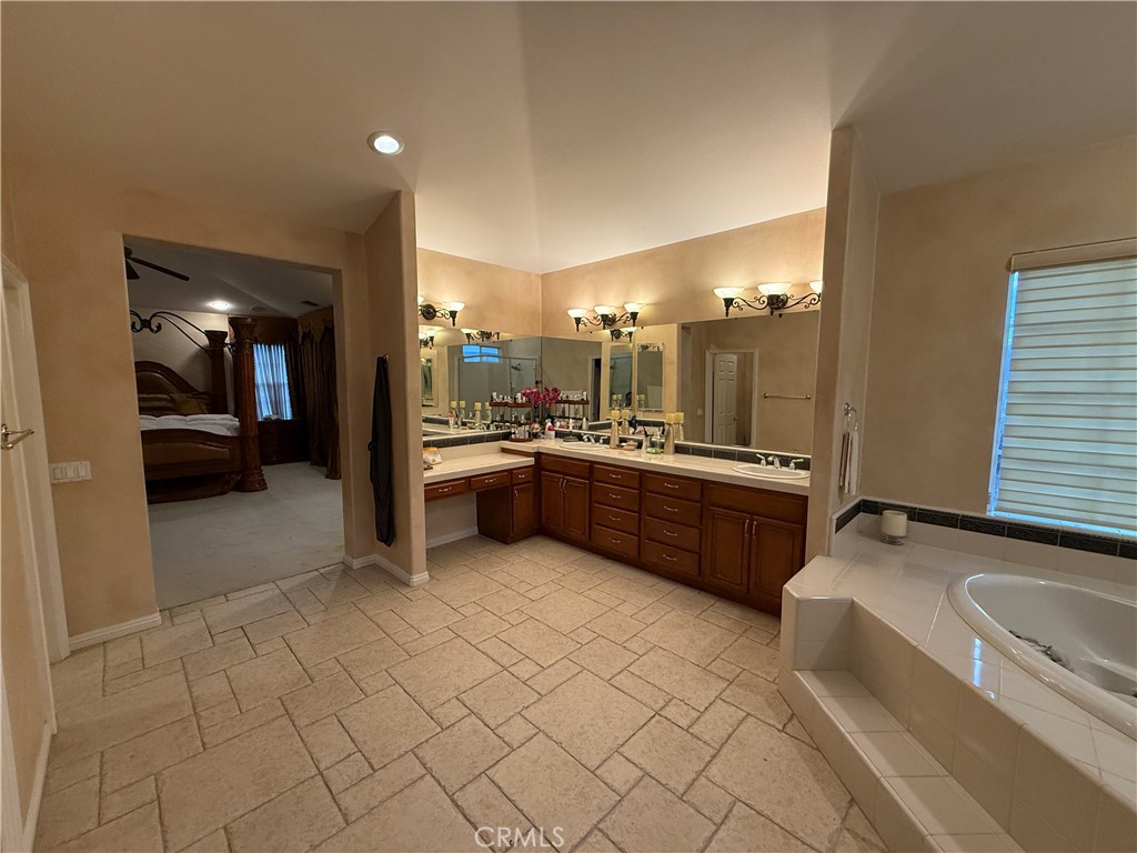 2119 Ridgeview Terrace Drive Signal Hill, CA 90755 - Photo 20 of 22 a large bathroom with a large tub and double vanity