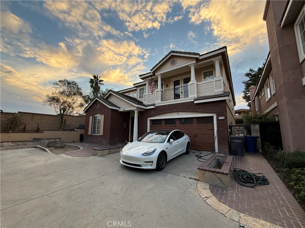 2119 Ridgeview Terrace Drive Signal Hill, CA 90755 - Photo 2 of 22 a car parked in front of house