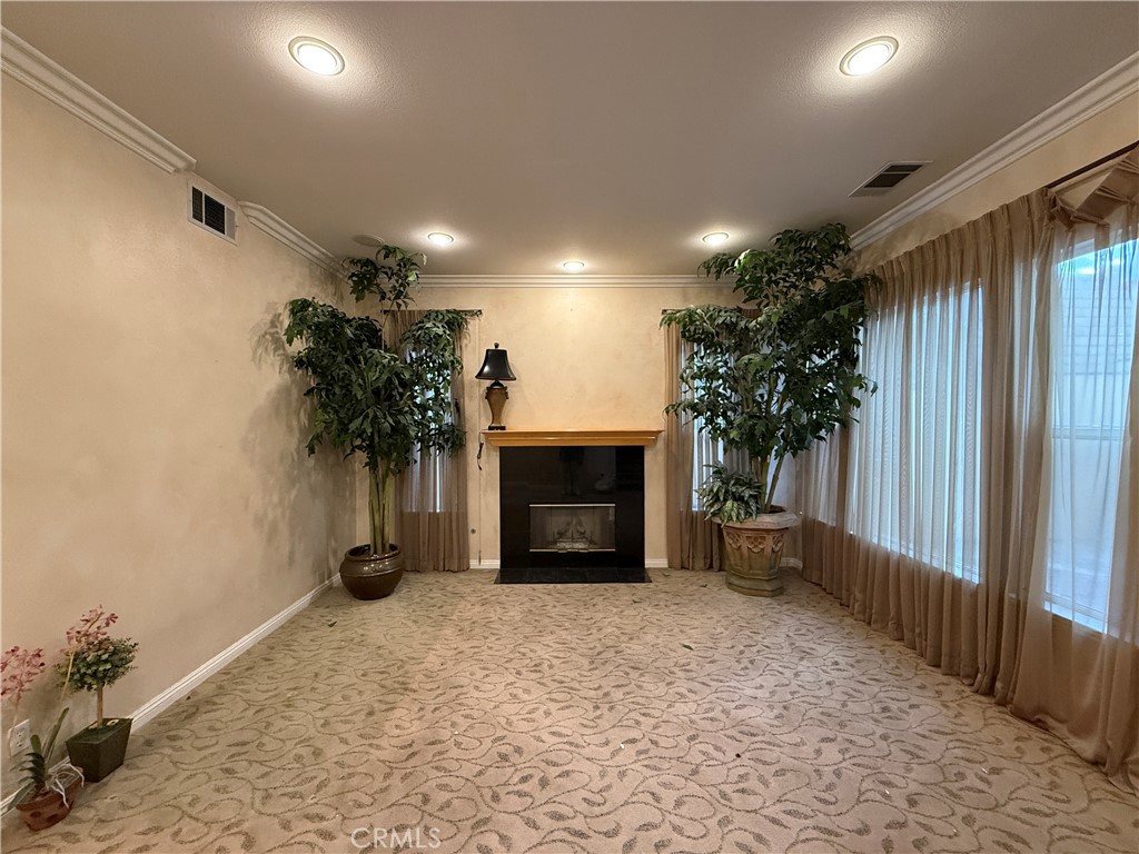 2119 Ridgeview Terrace Drive Signal Hill, CA 90755 - Photo 9 of 22 a view of a livingroom with a fireplace and potted plants