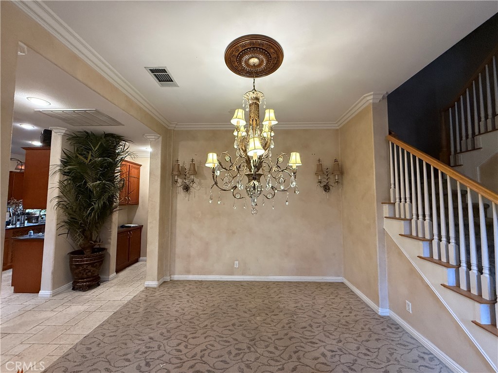 2119 Ridgeview Terrace Drive Signal Hill, CA 90755 - Photo 10 of 22 a view of a hallway with a chandelier
