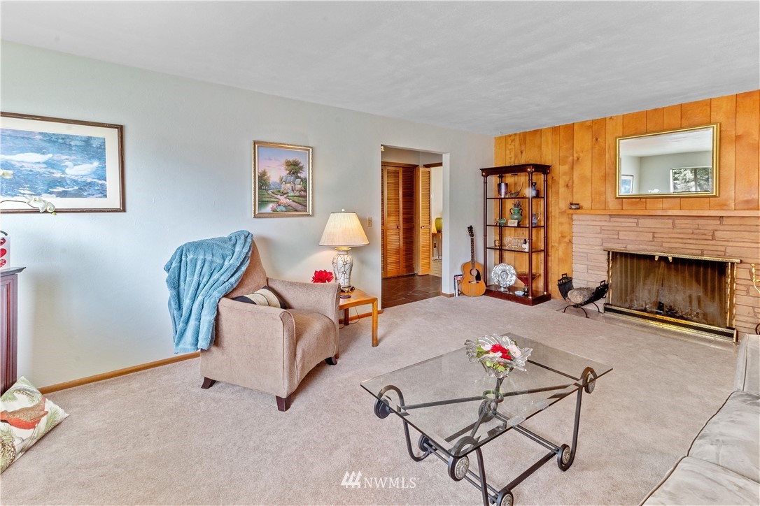 1710 Southwest Gails Avenue Chehalis, WA 98532 - Photo 11 of 24 a living room with furniture and a fireplace