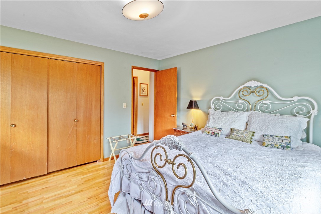 1710 Southwest Gails Avenue Chehalis, WA 98532 - Photo 13 of 24 a bedroom with a bed and a window