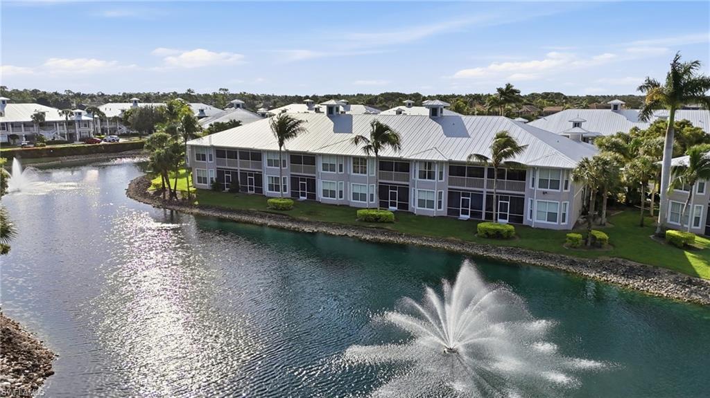 7920 Mahogany Run Lane, Unit 1015 Naples, FL 34113 - Photo 1 of 35 AERIAL VIEWS SHOWING STUNNING LAKE AND FOUNTAIN VIEWS FROM YOUR SCREENED LANAI..