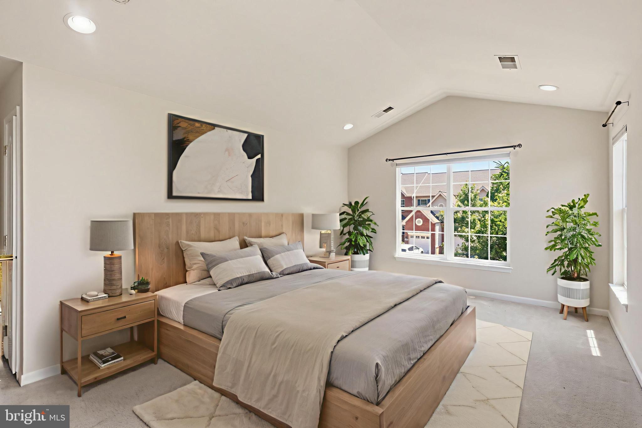 19617 Edgemont Square Ashburn, VA 20147 - Photo 25 of 65 a bedroom with a large bed and a potted plant