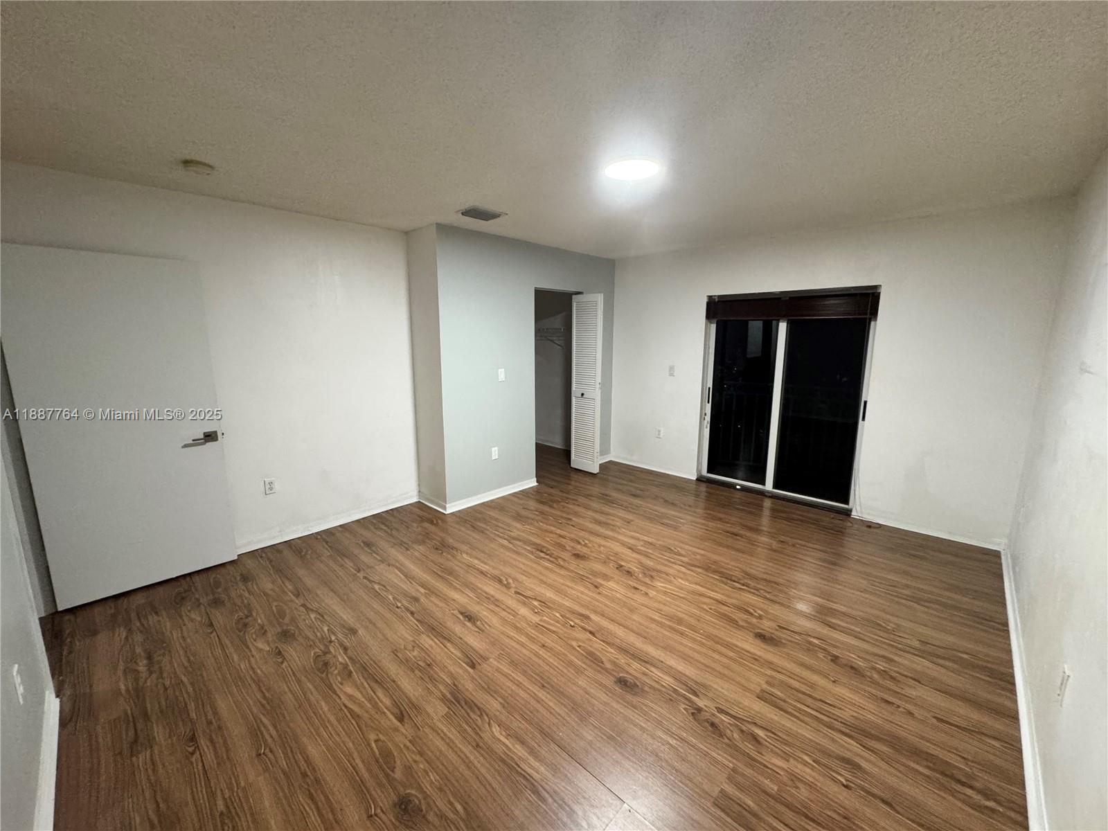 7005 Northwest 173rd Drive, Unit 1702 Hialeah, FL 33015 - Photo 14 of 17 Master bedroom