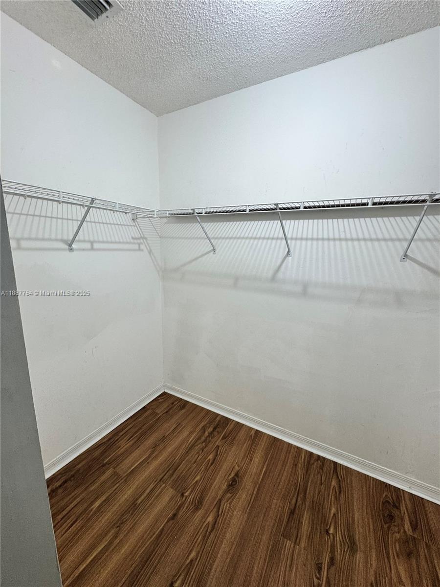 7005 Northwest 173rd Drive, Unit 1702 Hialeah, FL 33015 - Photo 15 of 17 Master Closet