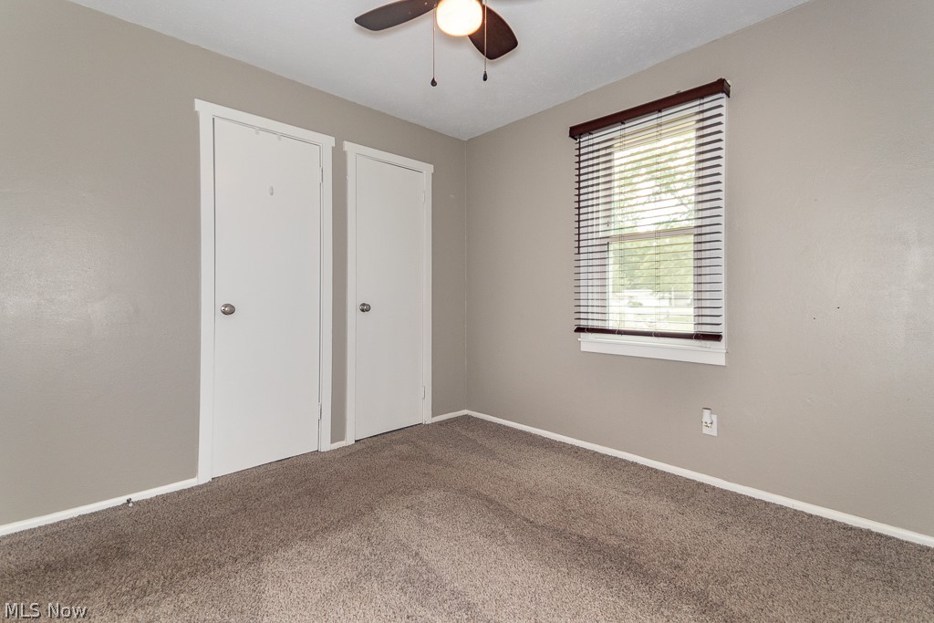 38488 Bell Road Willoughby, OH 44094 - Photo 12 of 22 Unfurnished bedroom with carpet and ceiling fan