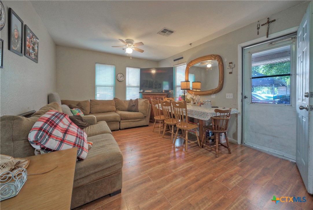 604 Vargas Road Austin, TX 78741 - Photo 11 of 25 a living room with furniture and a large window