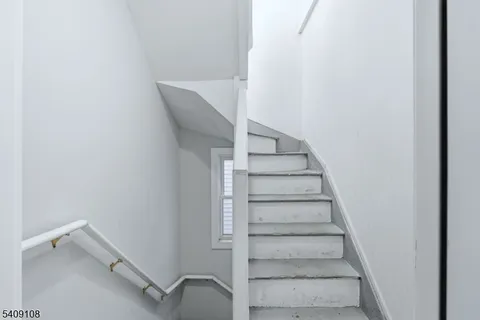a view of entryway with stairs