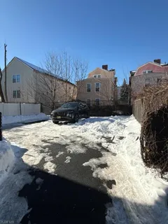 a view of a backyard of snow