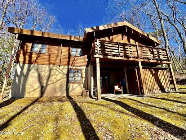 a view of a house with a balcony