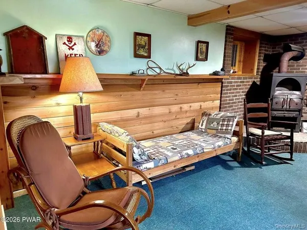 a bedroom with bed and window