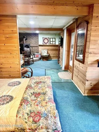 a bathroom with a toilet and a tub