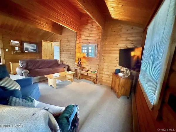 a living room with furniture and a couch