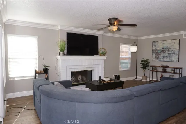 a view of living room with furniture and window