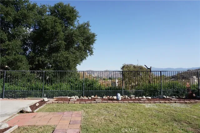 a view of an entryway with wooden floor and stairs
