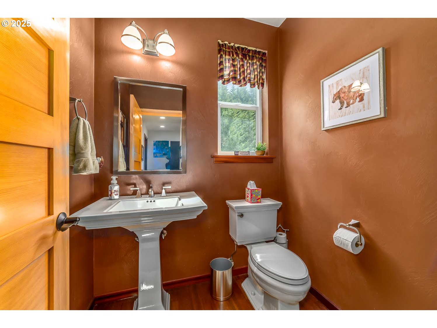 21626 Glaze Road Noti, OR 97461 - Photo 11 of 43 a bathroom with a toilet sink and mirror