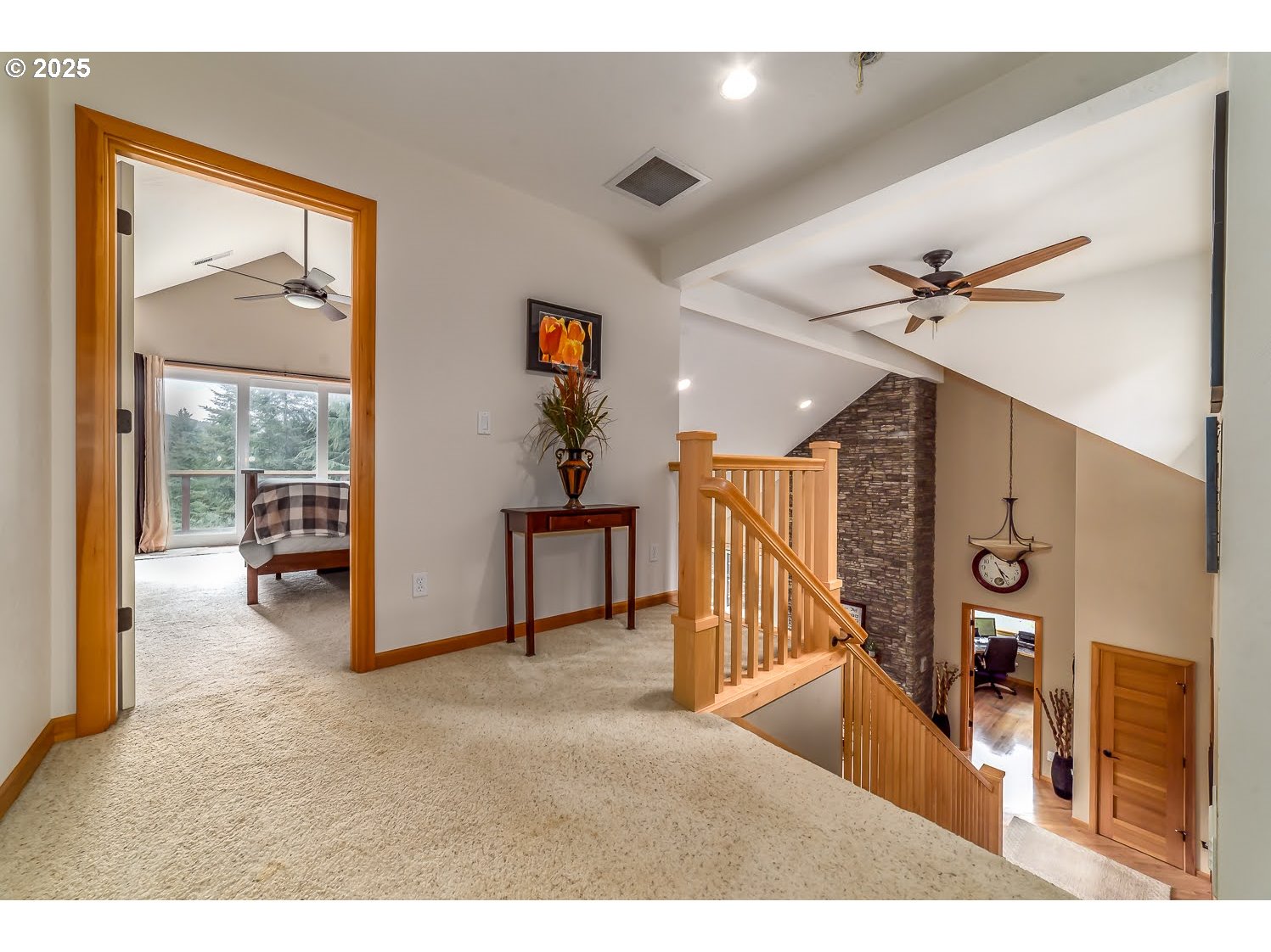 21626 Glaze Road Noti, OR 97461 - Photo 13 of 43 a view of a livingroom with furniture and a floor to ceiling window