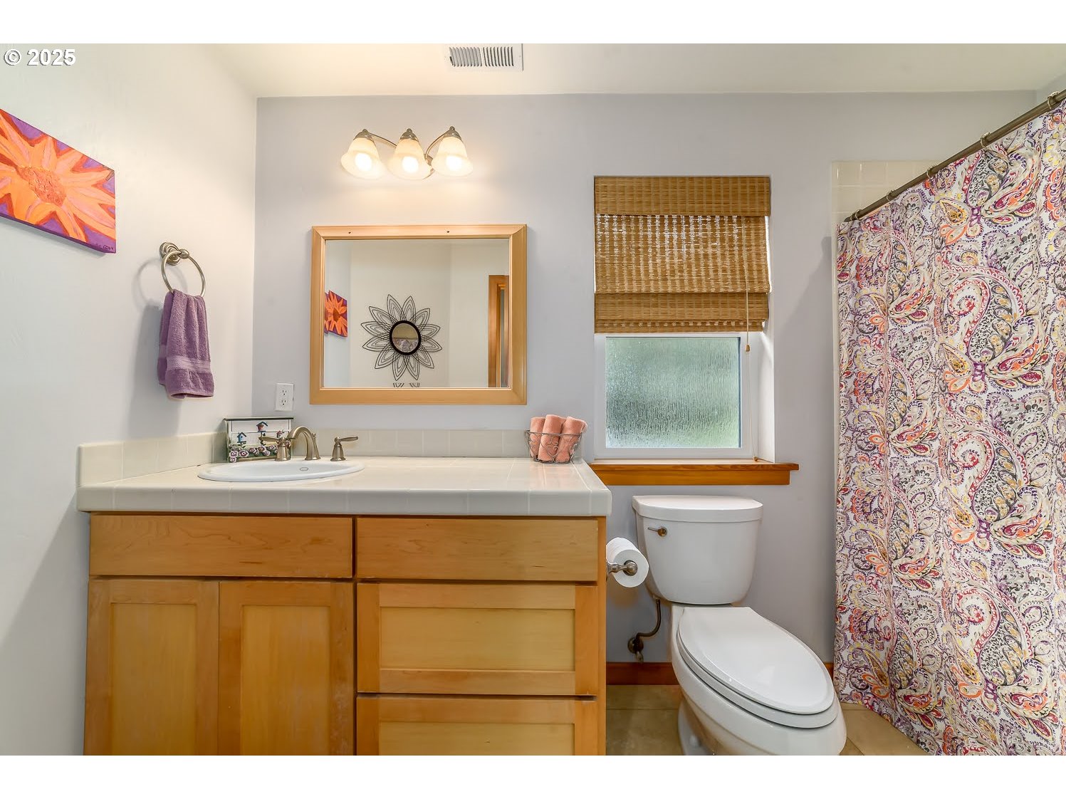 21626 Glaze Road Noti, OR 97461 - Photo 18 of 43 a bathroom with a granite countertop toilet sink and mirror