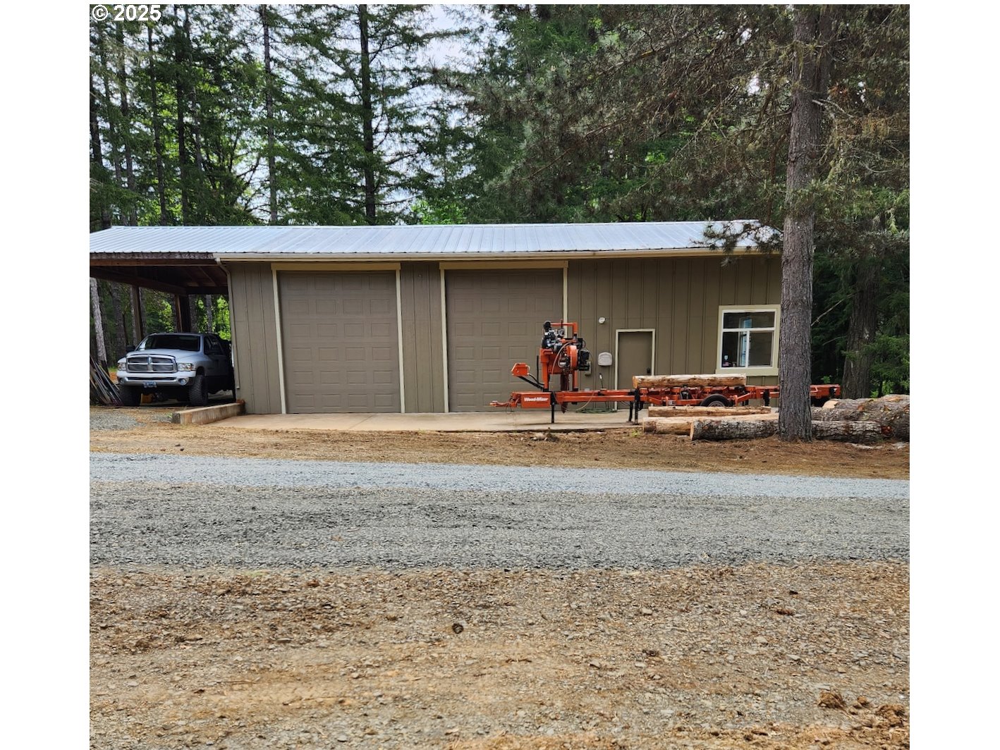 21626 Glaze Road Noti, OR 97461 - Photo 33 of 43 a view of a car parked in back yard