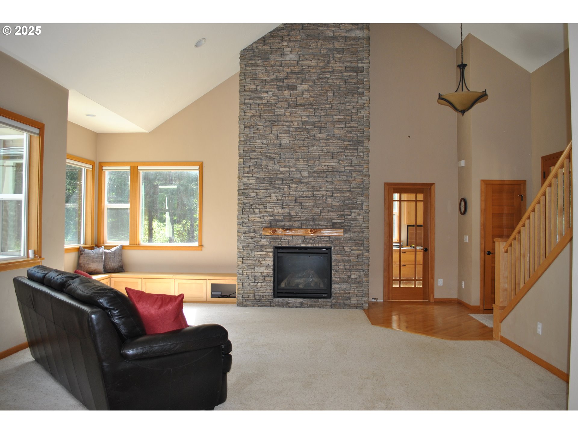 21626 Glaze Road Noti, OR 97461 - Photo 4 of 43 a living room with furniture and a fireplace