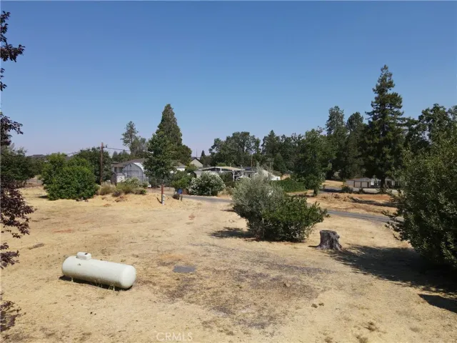 a view of mountain view with wooden fence