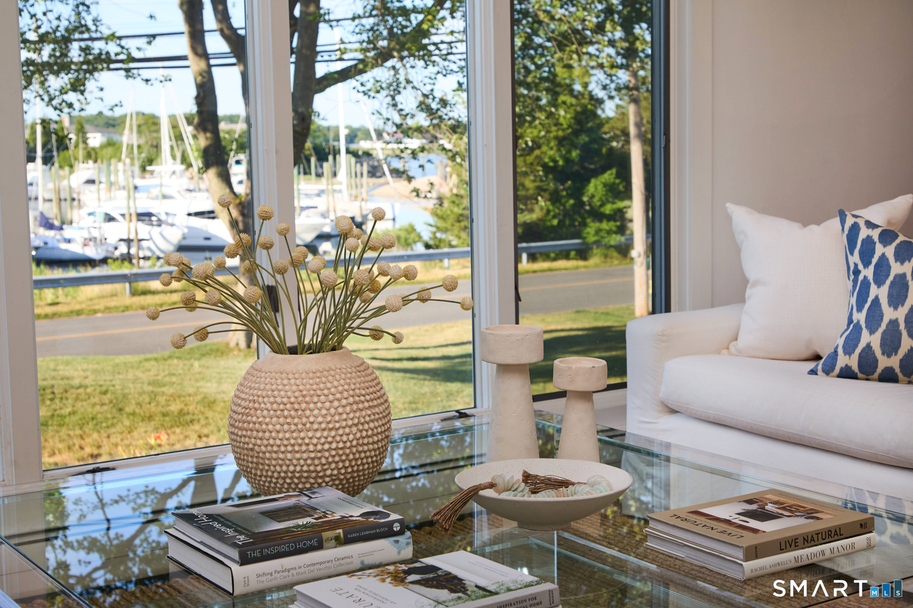 16 Harbor Road Westport, CT 06880 - Photo 4 of 36 a living room with furniture and a floor to ceiling window