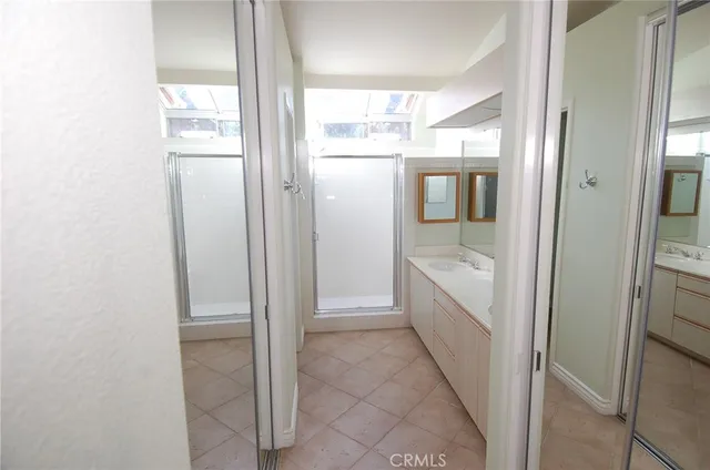 a bathroom with a bathtub and a sink