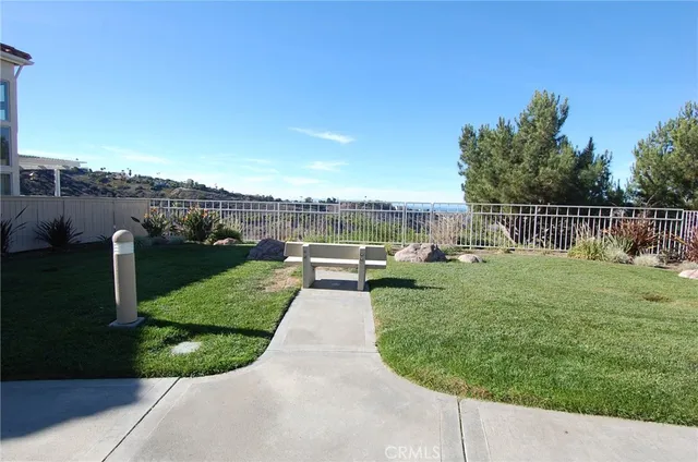 a view of a garden with houses