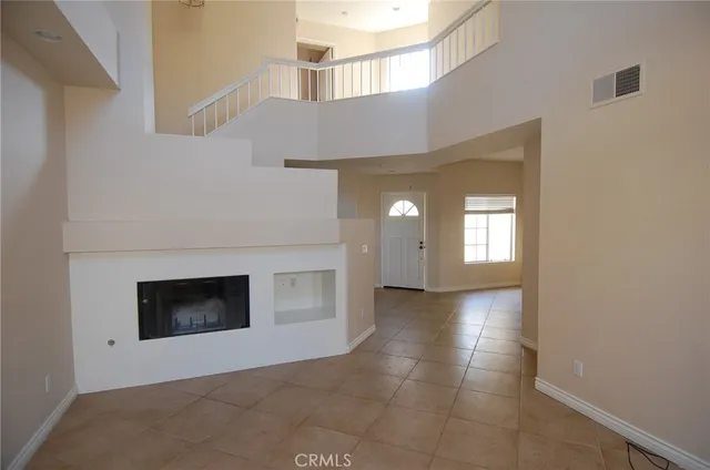 a view of a livingroom with a fireplace
