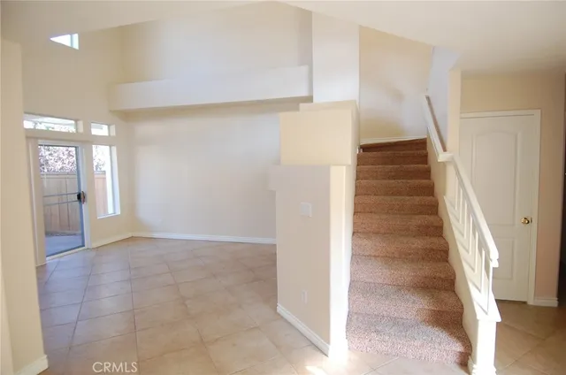 a view of entryway with stairs