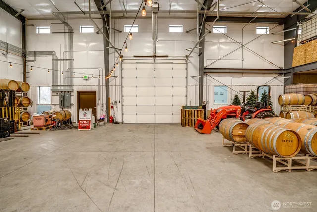 a view of a garage with a table and chairs