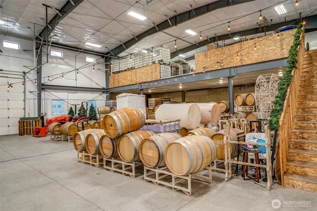 a view of parking garage with cars