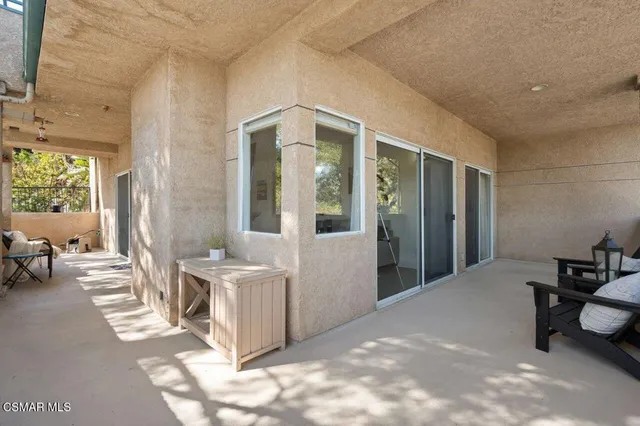 a view of a living room and entry way