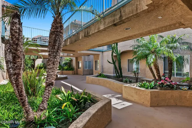 front view of a house with a small yard