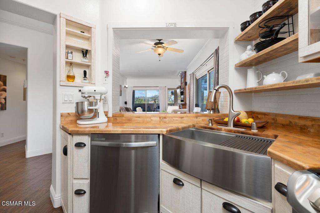 2716 Borchard Road Newbury Park, CA 91320 - Photo 10 of 30 a kitchen with stainless steel appliances granite countertop a sink and a stove