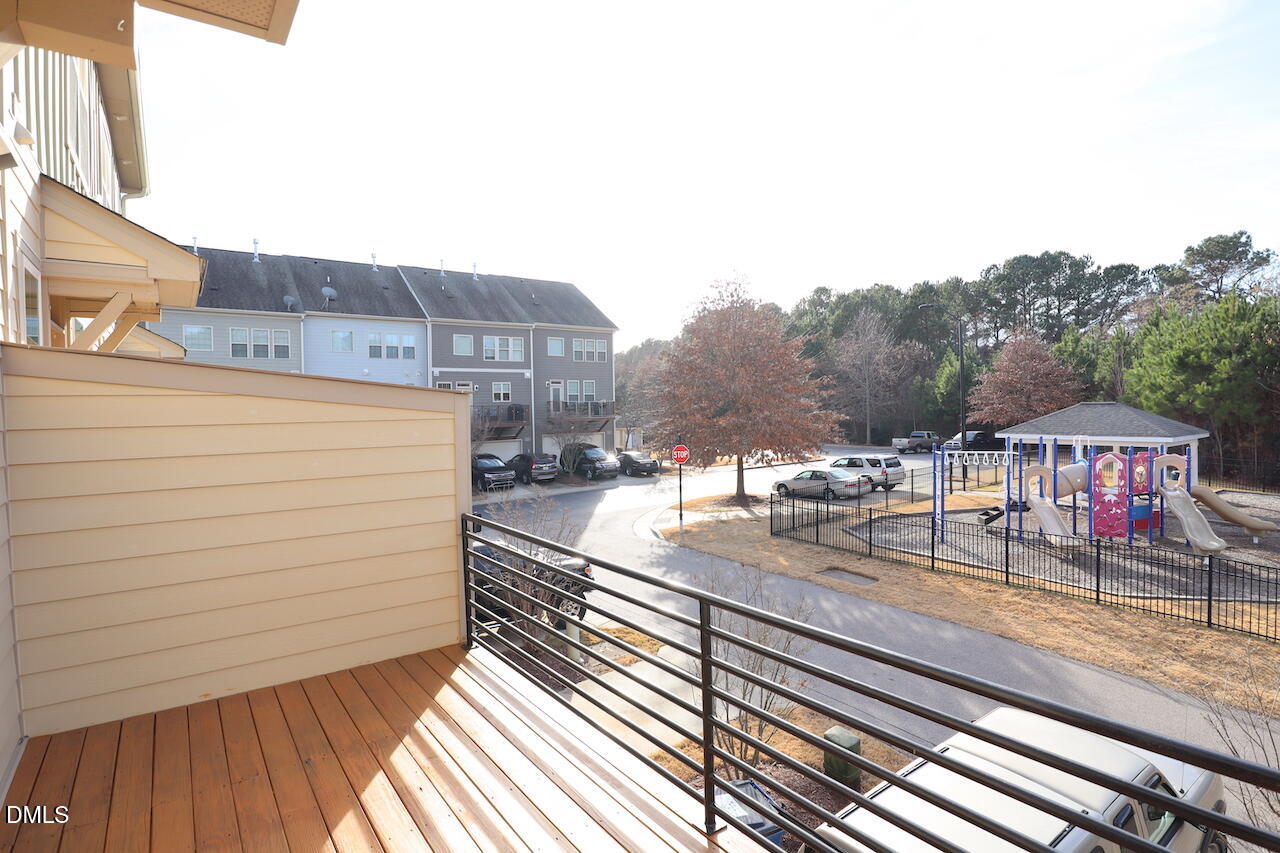 1517 Crafton Way Raleigh, NC 27607 - Photo 21 of 28 a view of a terrace with wooden floor