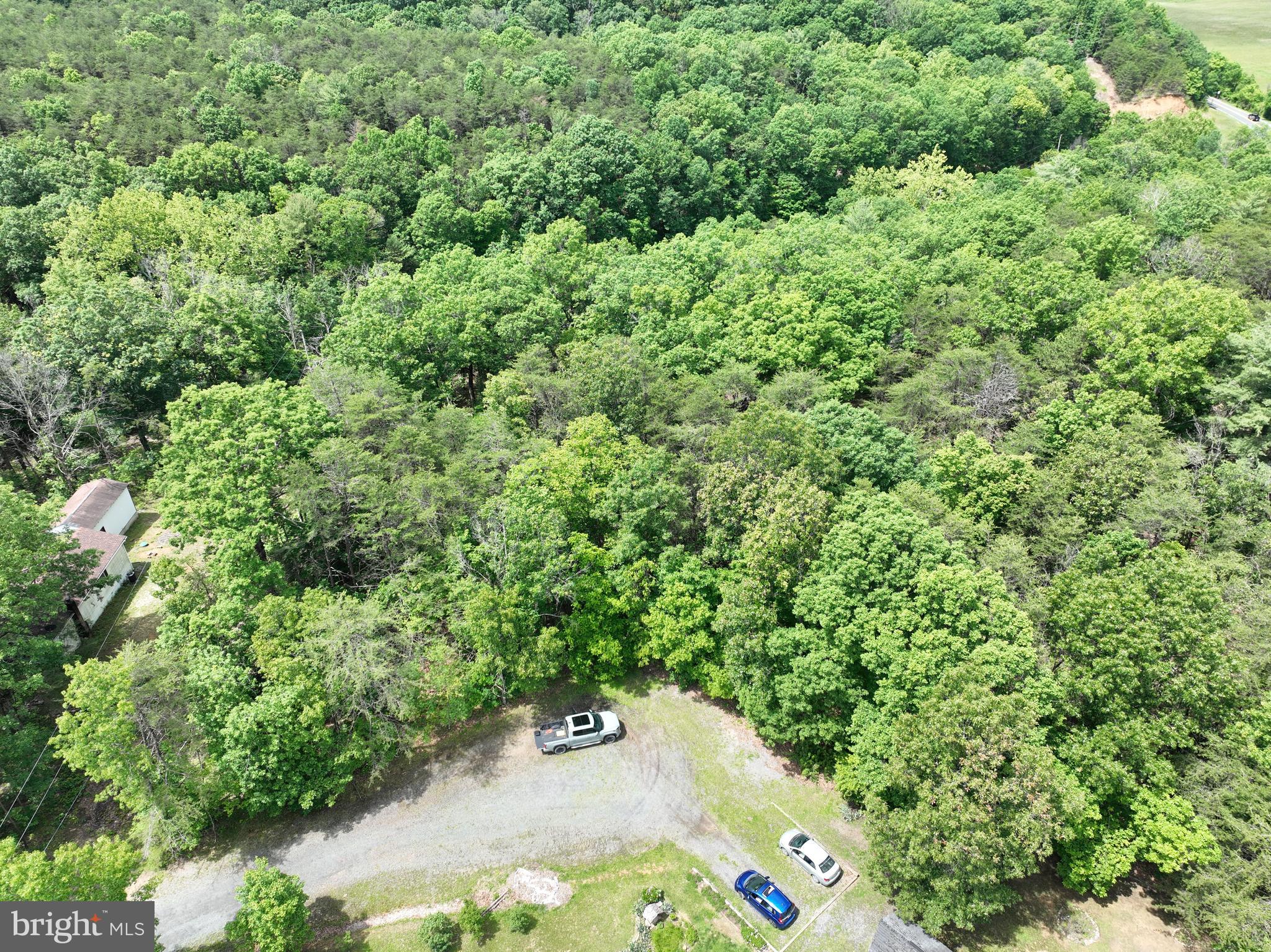 2.23-ac Doe Trail Springfield, WV 26763 - Photo 16 of 19 an aerial view of a house with a yard